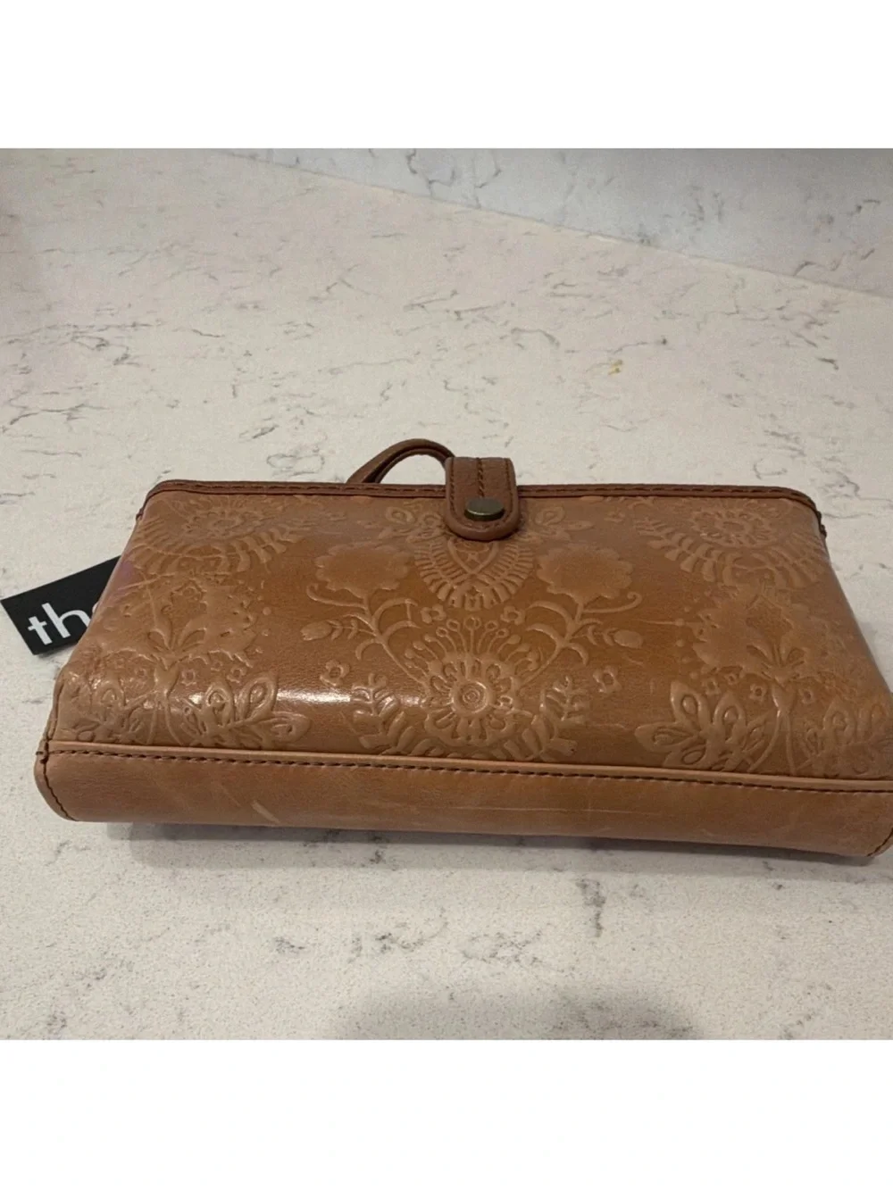The Sak Iris Brown Floral Embossed Wristlet Zip Wallet Organizer Credit Card